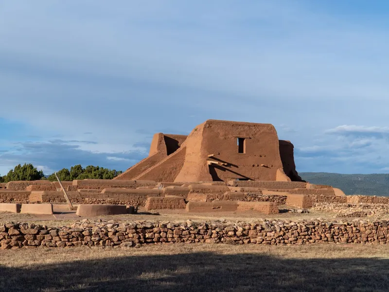 Adobe mission ruins and stone foundations at Pecos National Historical Park in New Mexico
