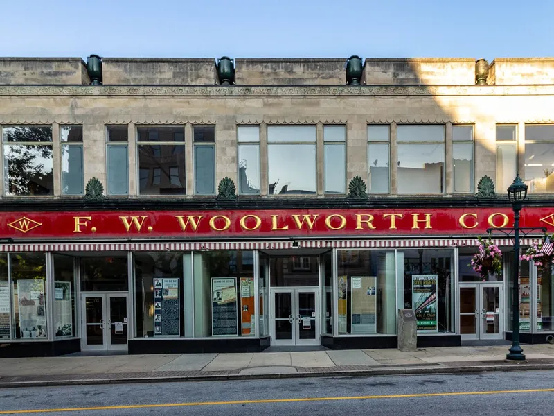 Historic Woolworth building in Greensboro, now the International Civil Rights Center and Museum, with exhibit panels in the windows