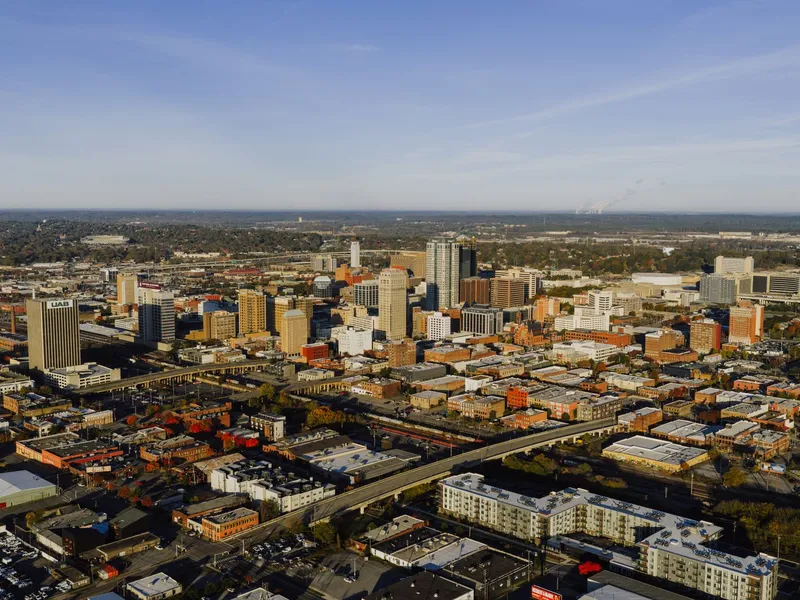 Aerial view of downtown Birmingham, Alabama and the surrounding city grid in daylight