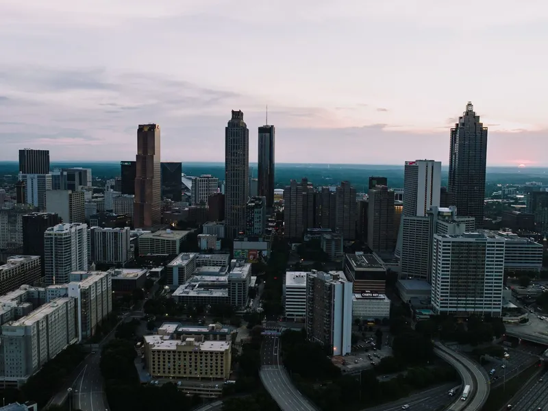 Atlanta, Georgia skyline from above at dusk with highways below the towers