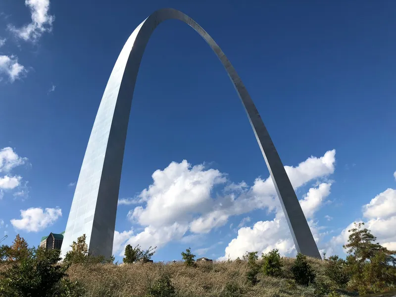 Gateway Arch rising against a blue sky in St. Louis, Missouri