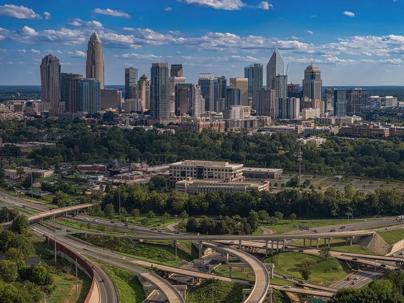 Charlotte, North Carolina skyline and interchange on a sunny summer day