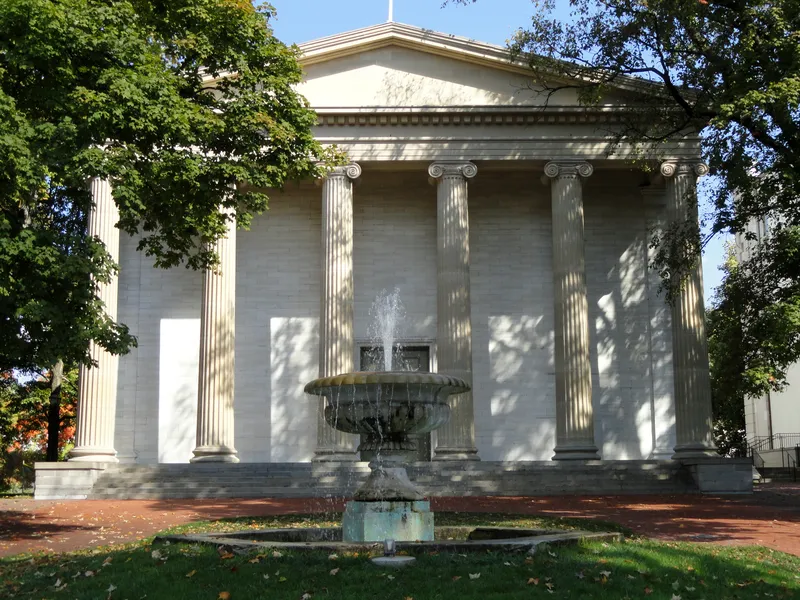 Greek Revival Old State Capitol in Frankfort, Kentucky, with ionic columns and a fountain in front
