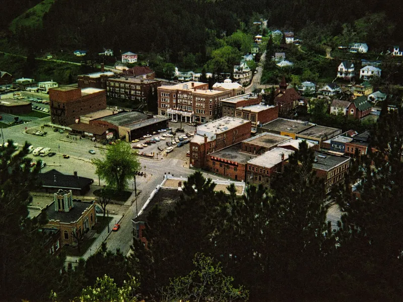 Aerial view of the brick downtown and surrounding homes of Lead in the Black Hills