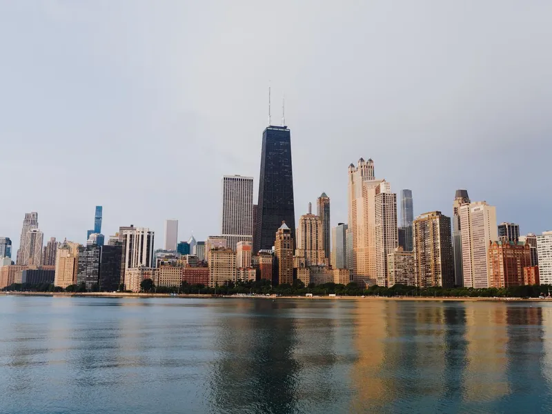Chicago skyline along Lake Michigan with the John Hancock Center rising above lakefront high-rises