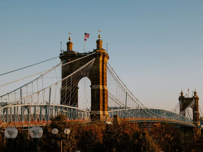 Roebling Suspension Bridge spanning the Ohio River at Cincinnati against a clear sky